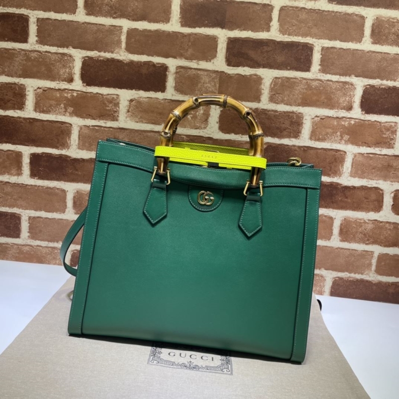 G*u*i top handle bags